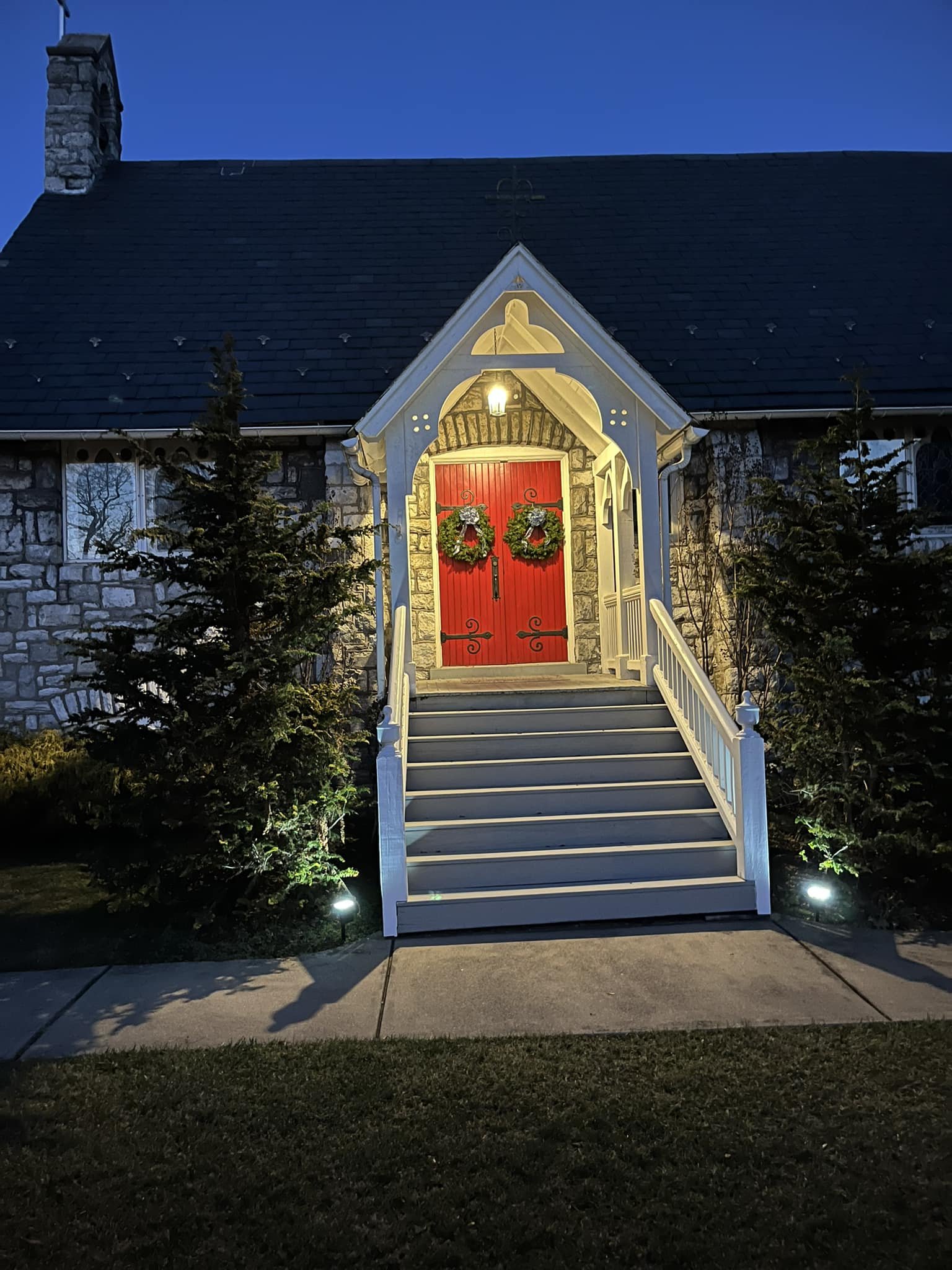 front doors of Saint Luke decorated with Christmas wreaths