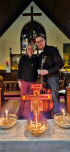 Two priests enjoying Taize worship
