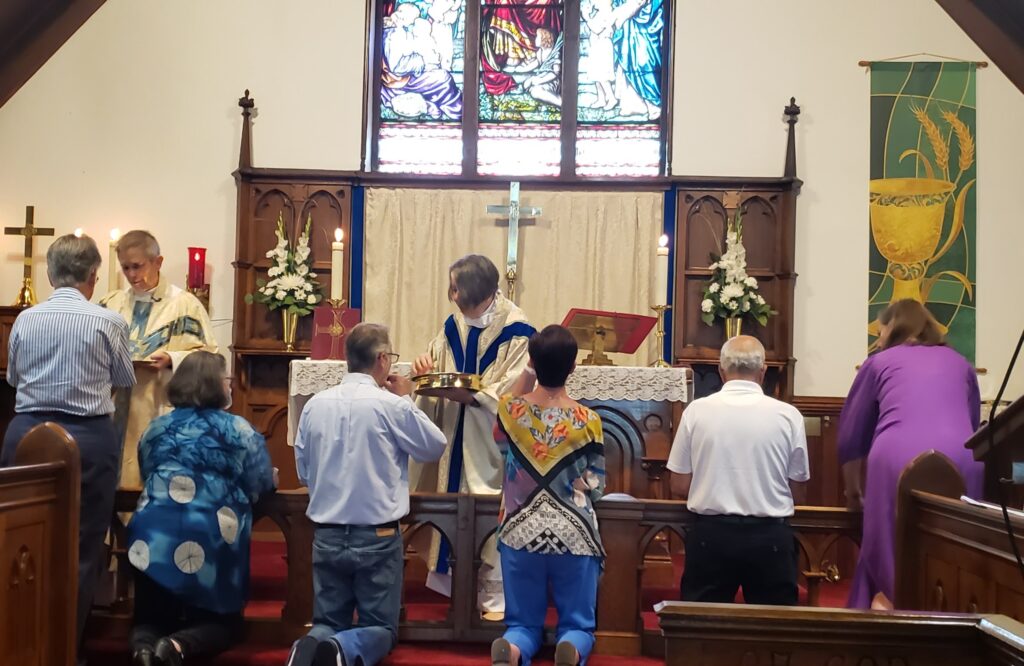 people receiving communion