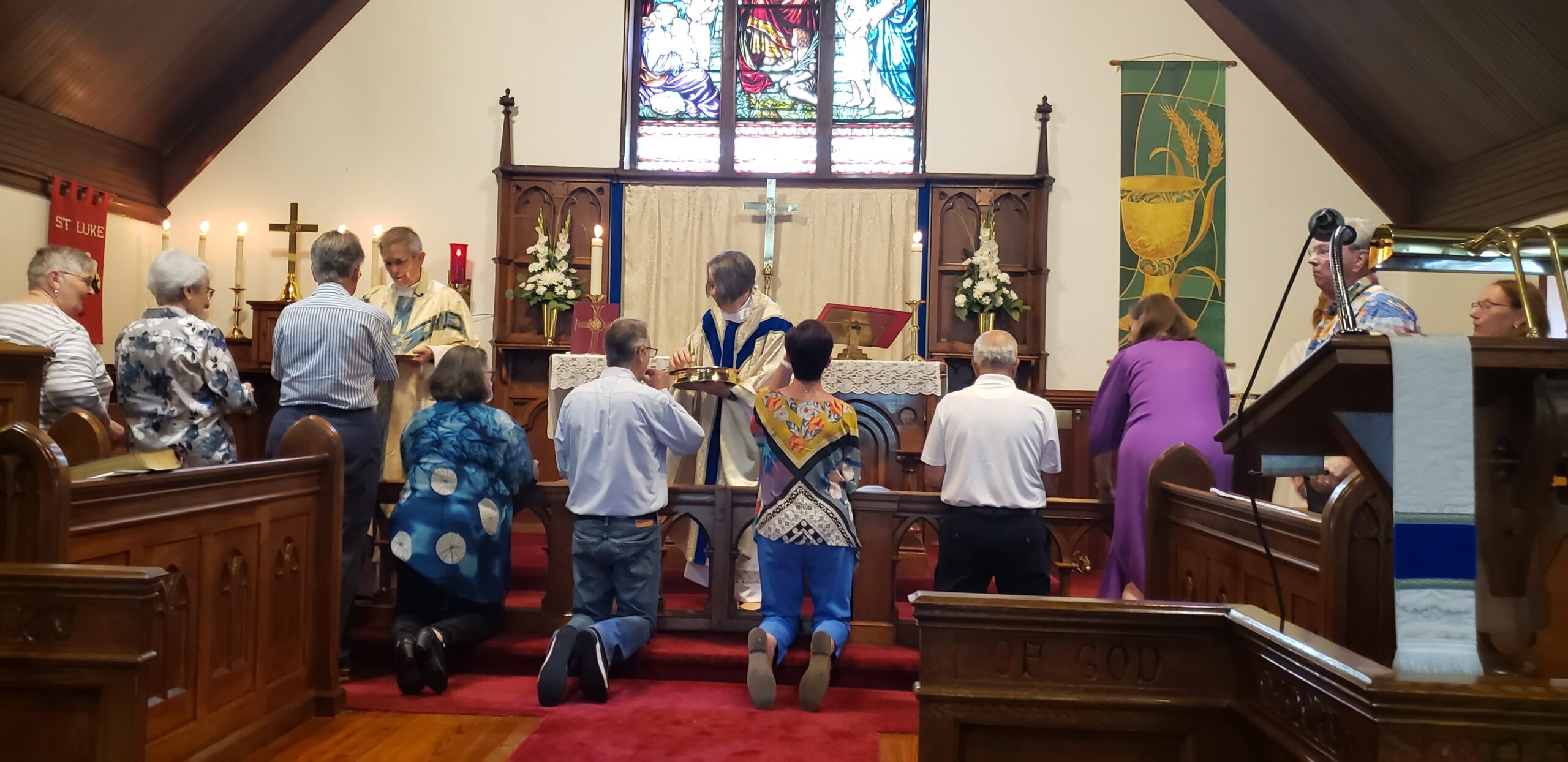 people receiving communion