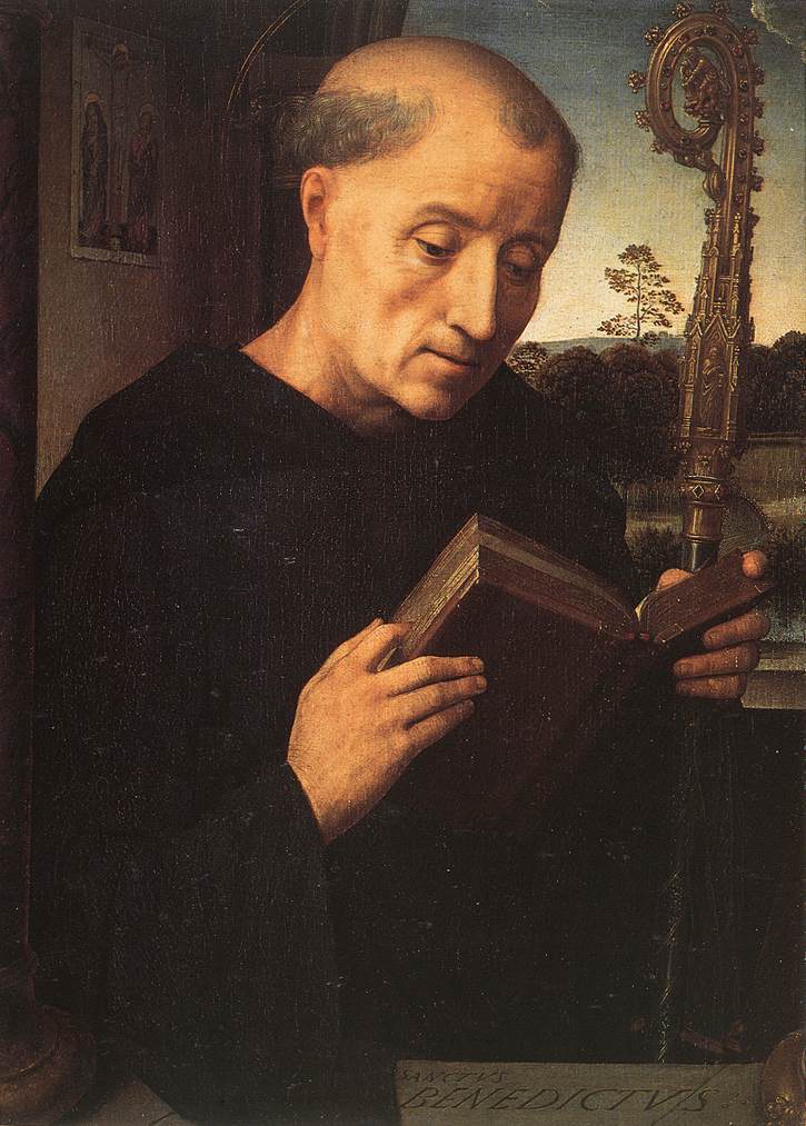 image of a monk holding a bible