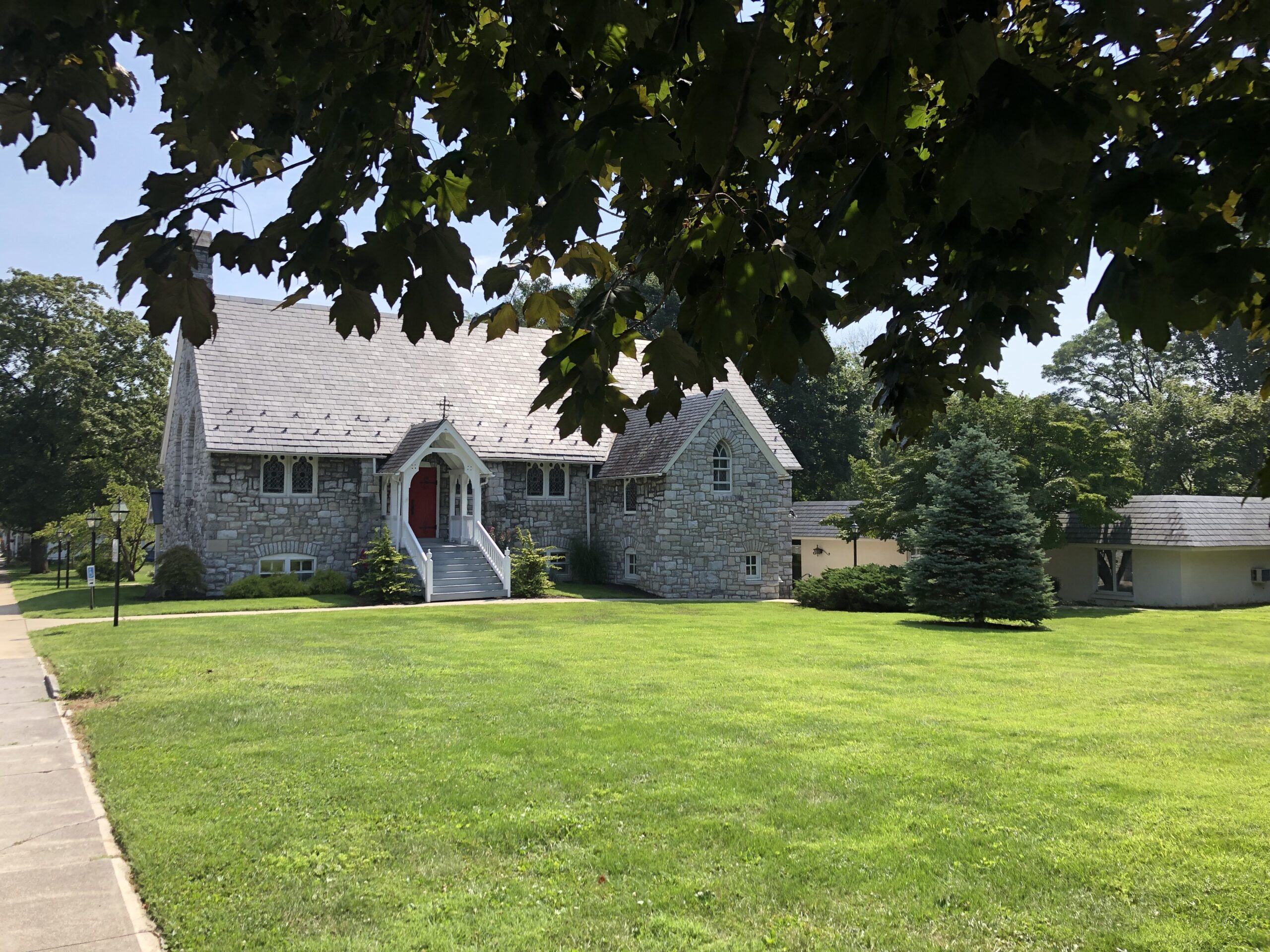 the lawn in the front of a church