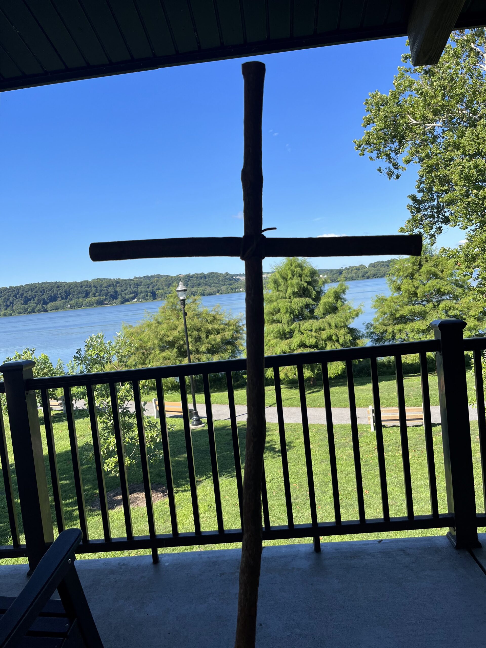 wooden cross overlooking the river